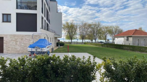 Luxus Apartment direkt am See, Csopak